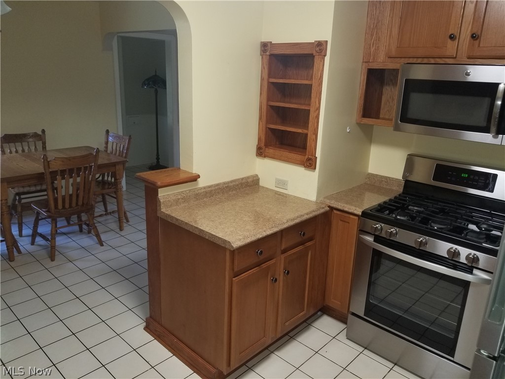 4002 Redfern Road Parma, OH 44134 - Photo 5 of 26 Even more counter space! Kitchen opens up to the dining area.