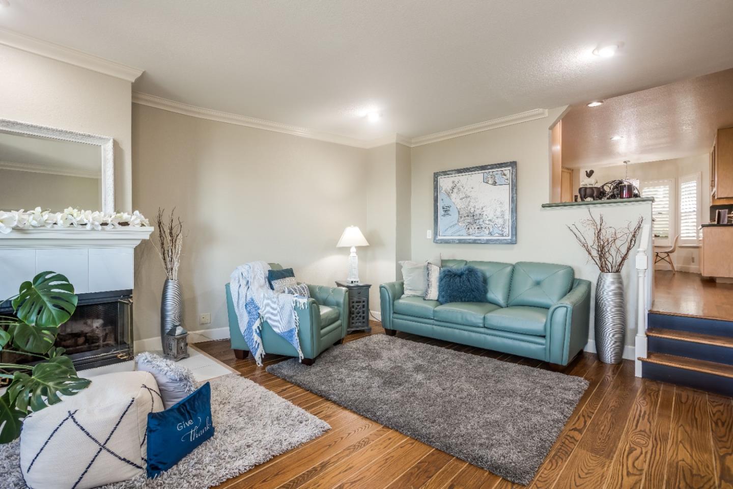 8898 Skyline Boulevard Oakland, CA 94611 - Photo 16 of 35 a living room with furniture and a fireplace