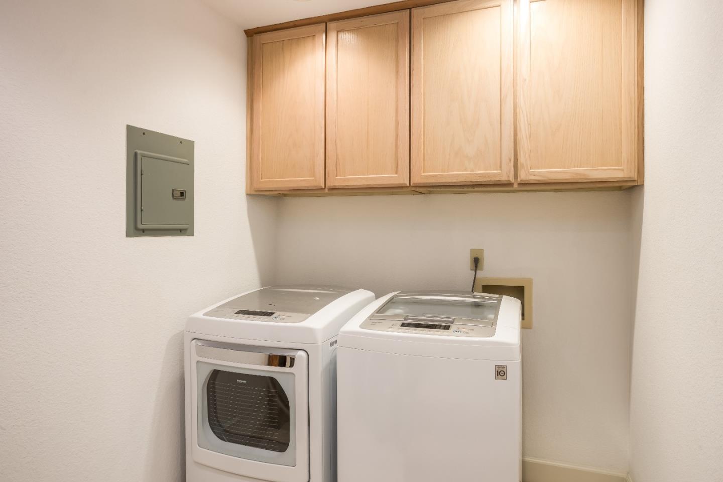 8898 Skyline Boulevard Oakland, CA 94611 - Photo 28 of 35 a utility room with dryer and washer
