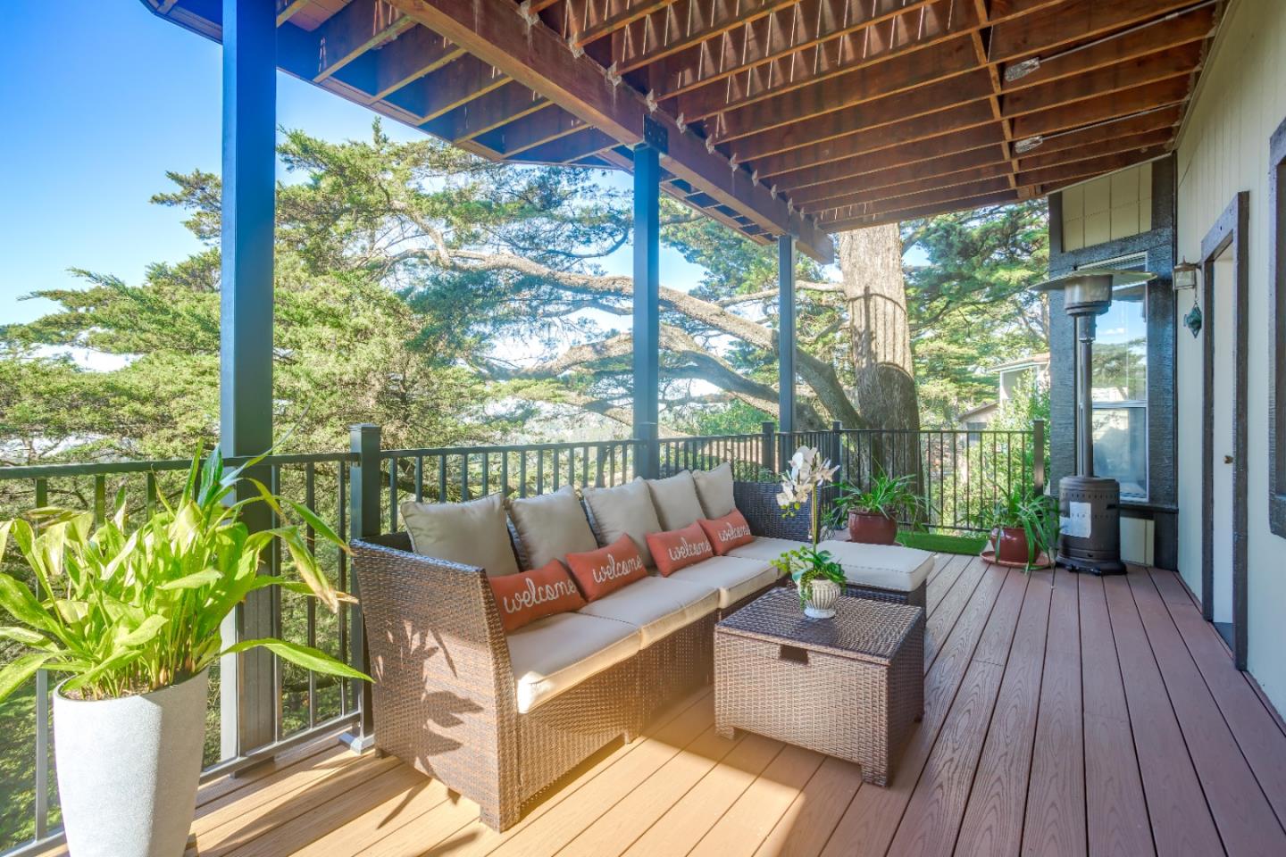 8898 Skyline Boulevard Oakland, CA 94611 - Photo 29 of 35 a balcony with furniture and a potted plant