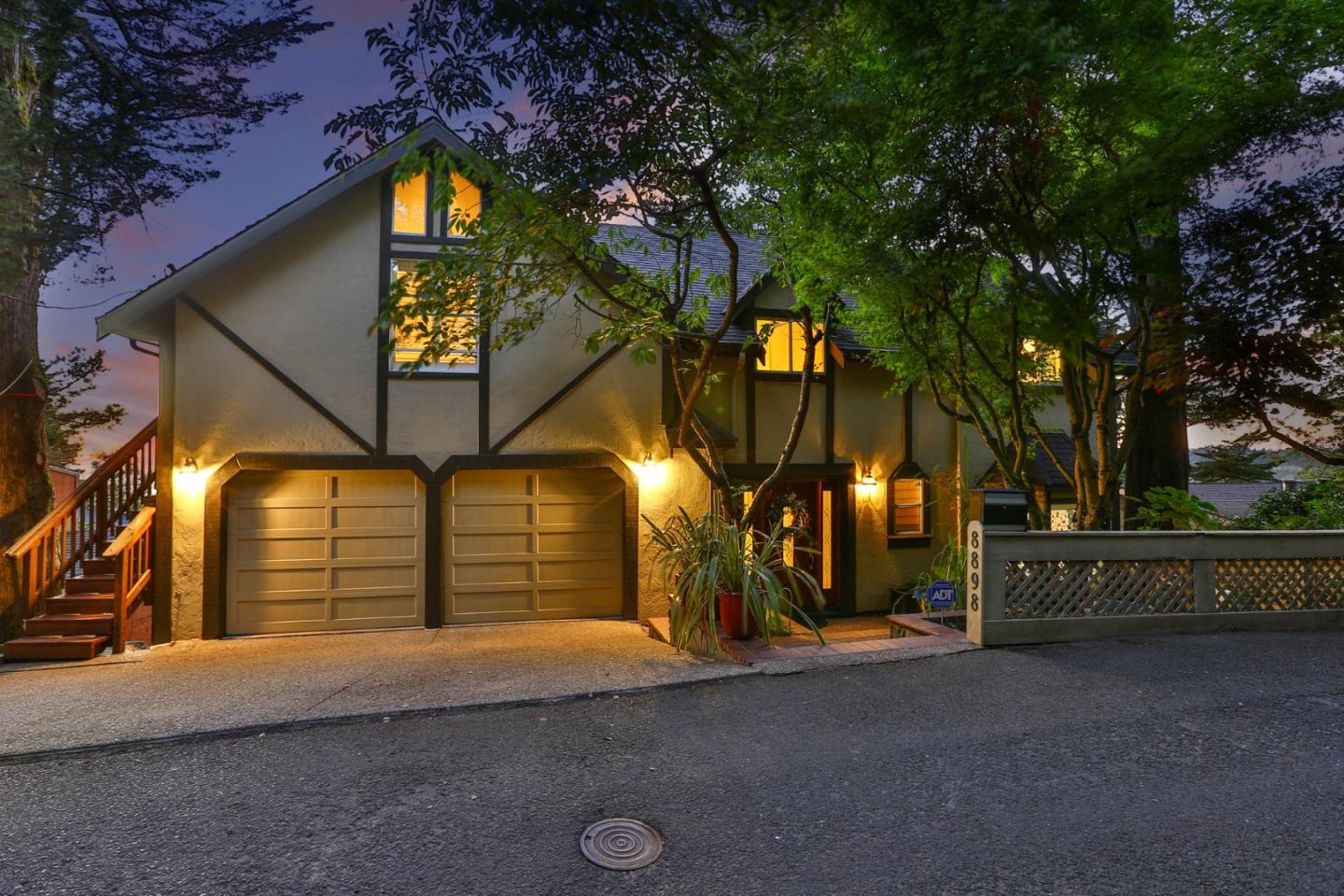 8898 Skyline Boulevard Oakland, CA 94611 - Photo 35 of 35 front view of a house with a street