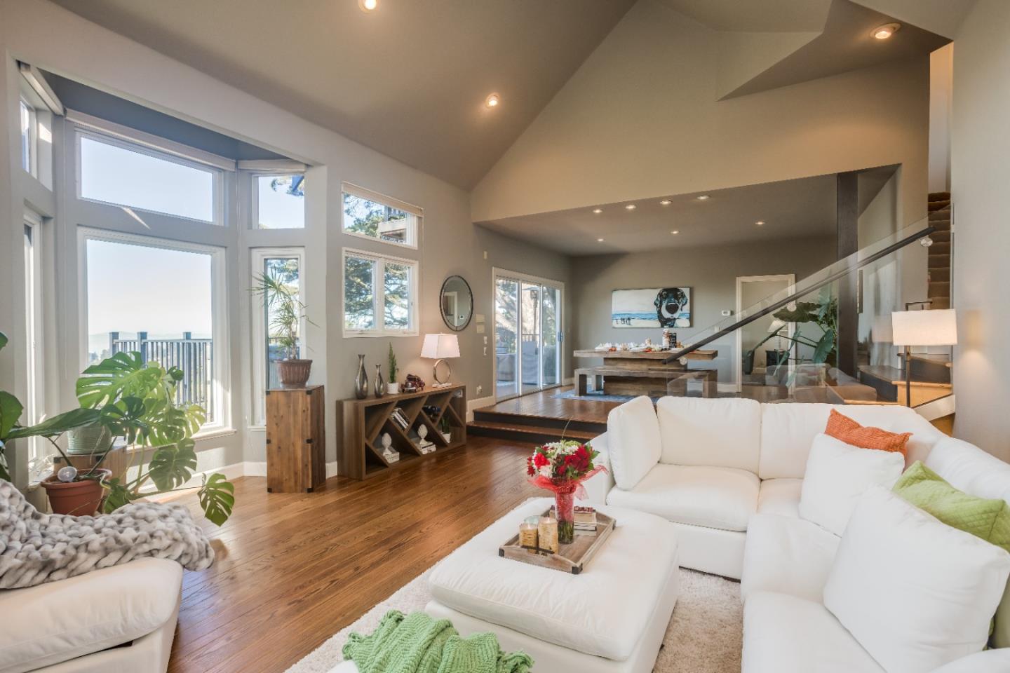 8898 Skyline Boulevard Oakland, CA 94611 - Photo 6 of 35 a living room with furniture and wooden floor