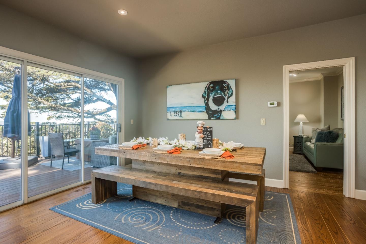 8898 Skyline Boulevard Oakland, CA 94611 - Photo 8 of 35 a reading room with furniture and wooden floor