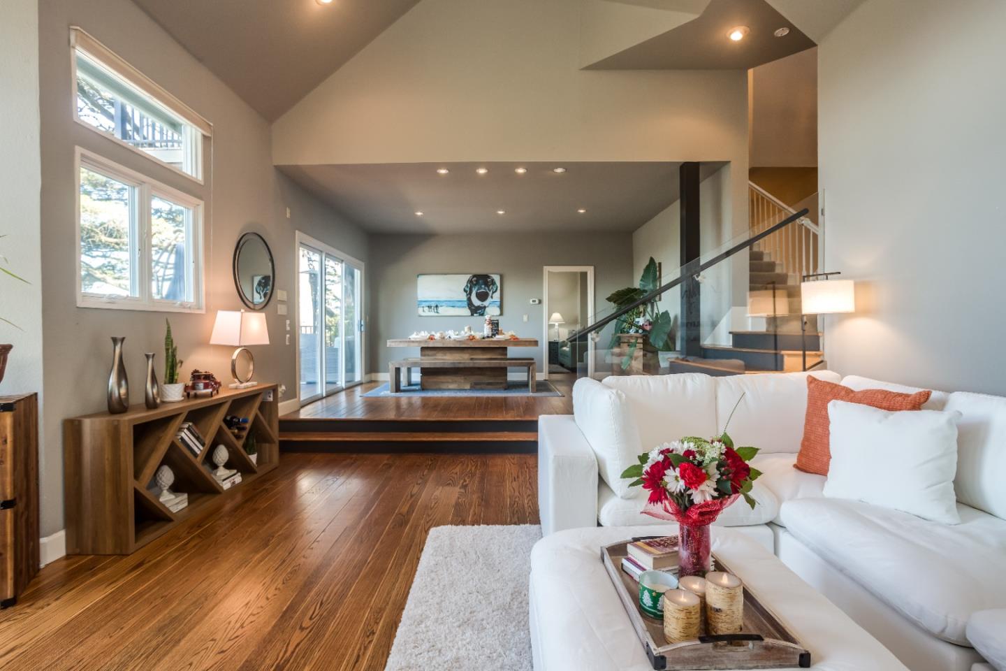 8898 Skyline Boulevard Oakland, CA 94611 - Photo 9 of 35 a living room with furniture and wooden floor