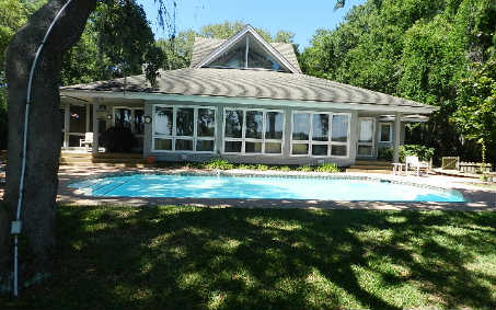 20 Sea Marsh Road Fernandina Beach, FL 32034 - Photo 1 of 12 a view of a house with a yard and sitting area