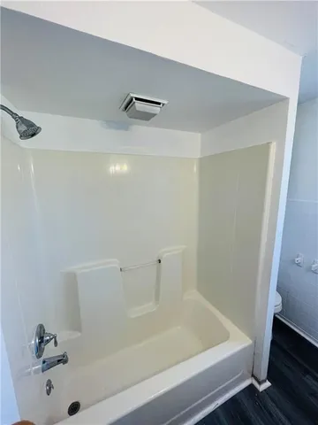 a bathroom with a bathtub