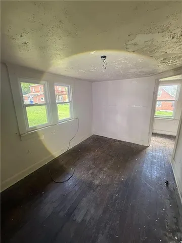 an empty room with windows