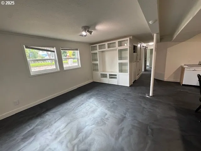 a view of a hallway with a large mirror