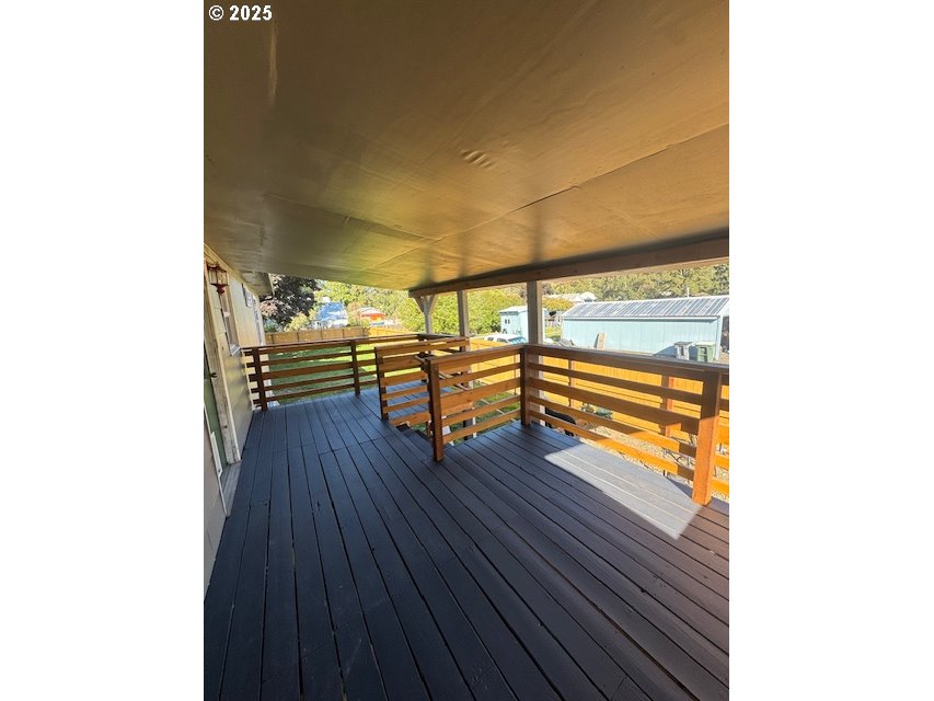 911 Division La Grande, OR 97850 - Photo 33 of 39 a view of a room with wooden floor