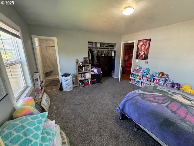 911 Division La Grande, OR 97850 - Photo 8 of 39 a bedroom with bed and a couch