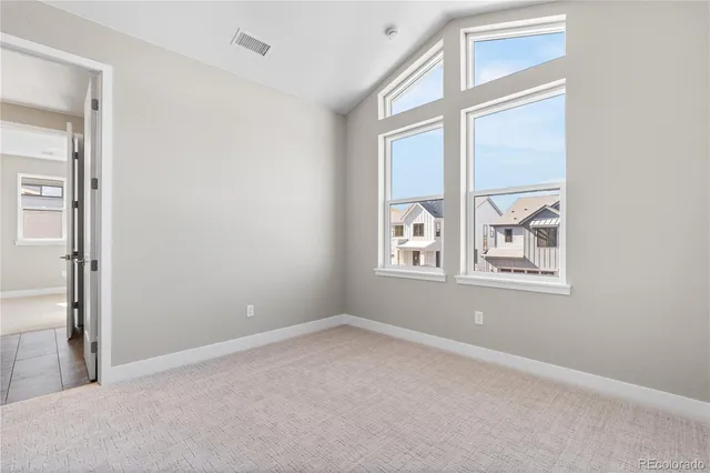 an empty room with windows