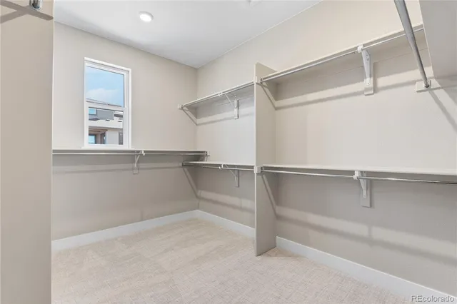 a view of an empty walk in closet