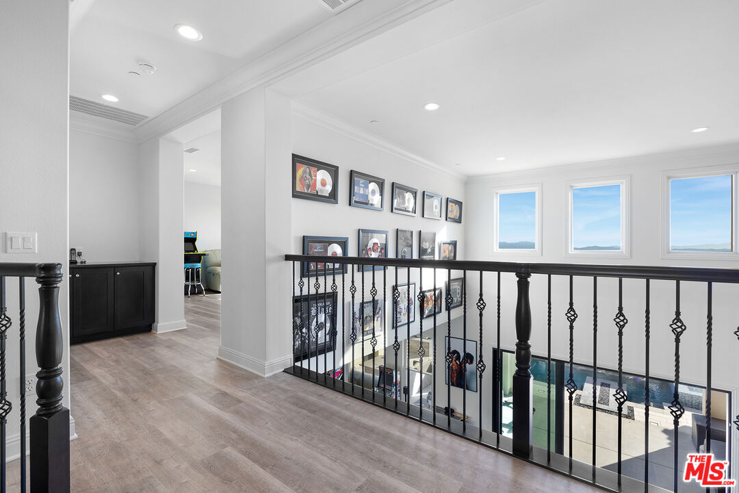 20234 Jubilee Way Porter Ranch, CA 91326 - Photo 24 of 30 a view of a hallway with windows