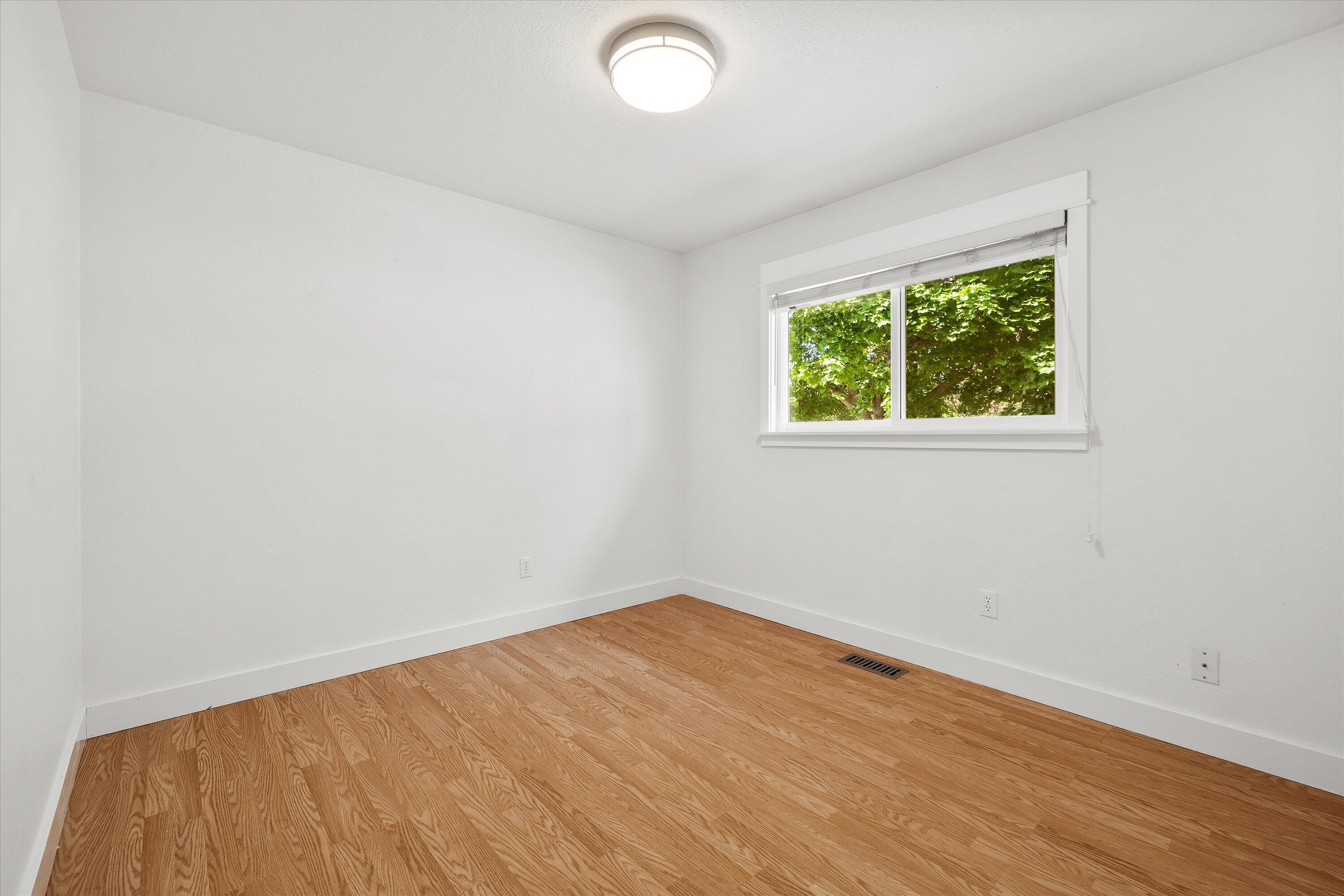 63634 Hunters Circle Bend, OR 97701 - Photo 15 of 28 an empty room with a window