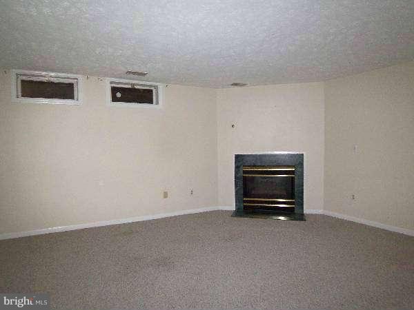 525 Ridgefield Avenue Stephens City, VA 22655 - Photo 12 of 26 a view of an empty room with a cabinet