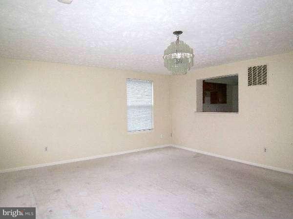 525 Ridgefield Avenue Stephens City, VA 22655 - Photo 16 of 26 en empty room with windows