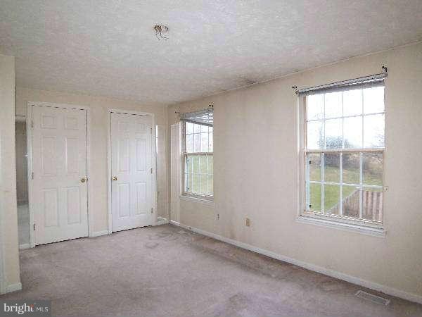 525 Ridgefield Avenue Stephens City, VA 22655 - Photo 22 of 26 a view of an empty room with a window