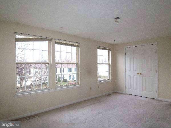 525 Ridgefield Avenue Stephens City, VA 22655 - Photo 8 of 26 a view of an empty room with a window