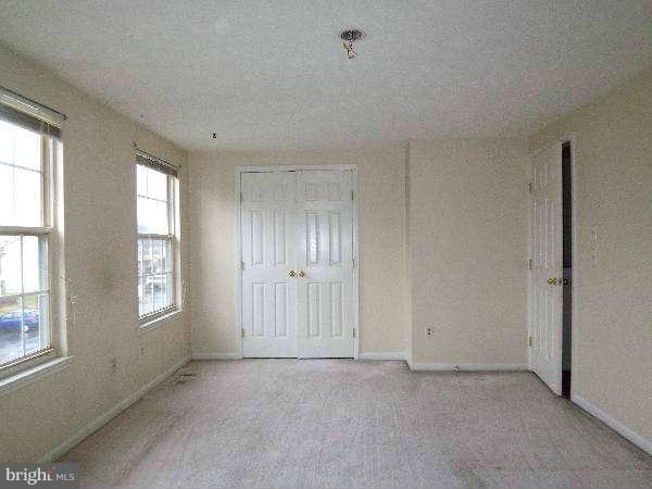 525 Ridgefield Avenue Stephens City, VA 22655 - Photo 9 of 26 a view of an empty room with windows