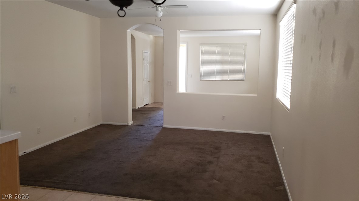 9112 Manalang Road Las Vegas, NV 89123 - Photo 33 of 50 A spacious common area offers direct entry to adjoining rooms and abundant natural light.