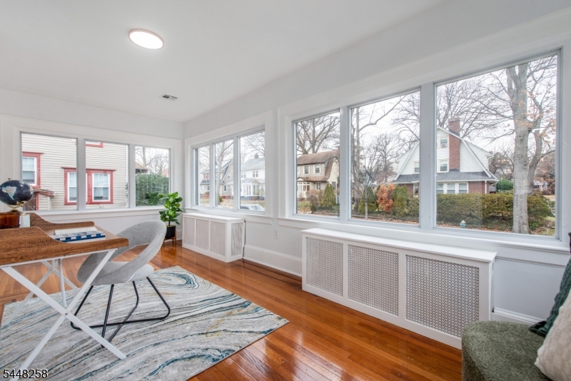 570 Cameron Road South Orange, NJ 07079 - Photo 14 of 32 a work space with wooden floor and furniture