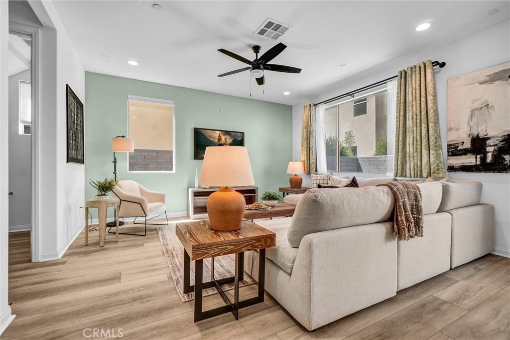 653 Longhorn Way Rancho Mission Viejo, CA 92694 - Photo 6 of 30 a living room with furniture