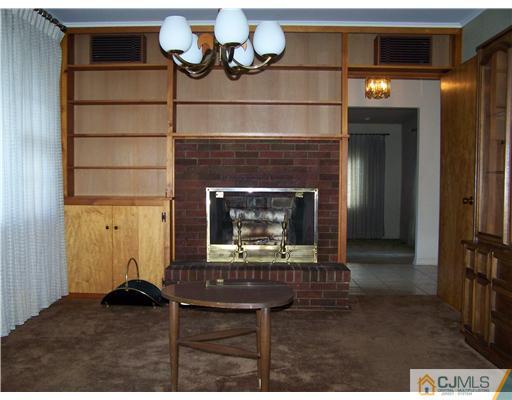28 Mosher Road Princeton, NJ 08540 - Photo 8 of 11 a living room with a fireplace