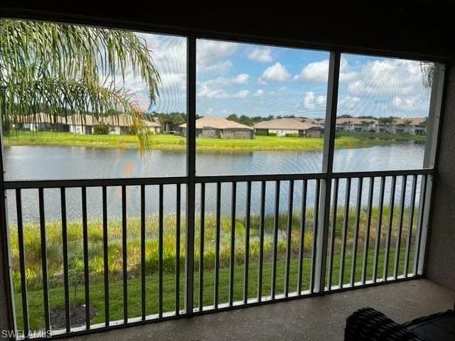 a view of a swimming pool from a balcony