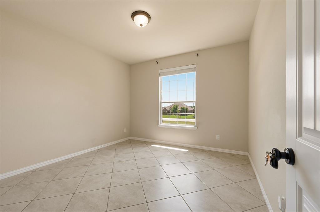 140 Heather Lane Decatur, TX 76234 - Photo 30 of 39 a view of an empty room with a window