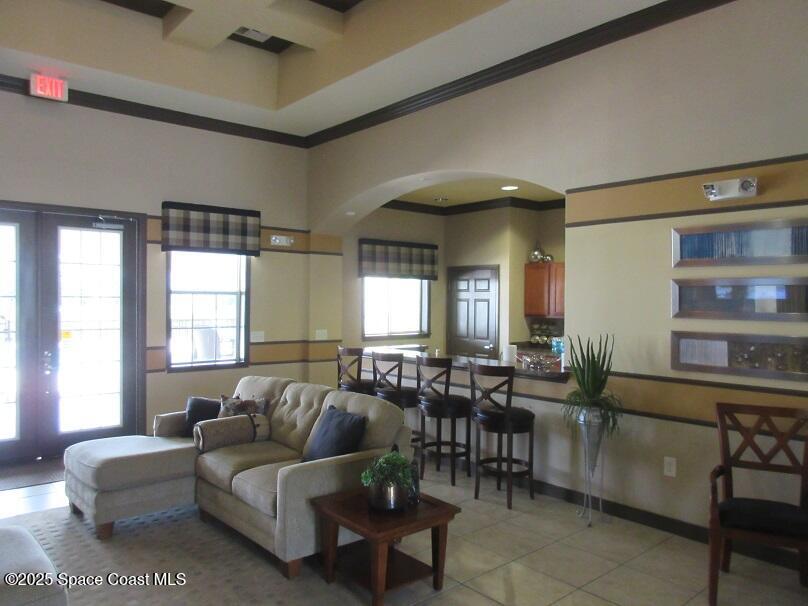 3551 D D'Avinci Way, Unit 1067 Melbourne, FL 32901 - Photo 21 of 27 Club House Lounge Kitchen