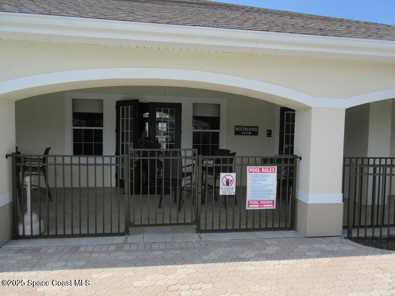 3551 D D'Avinci Way, Unit 1067 Melbourne, FL 32901 - Photo 22 of 27 Cover Porch- Pool View