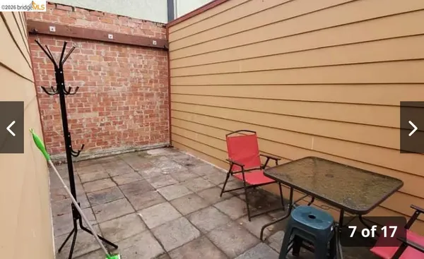 a backyard of a house with seating space