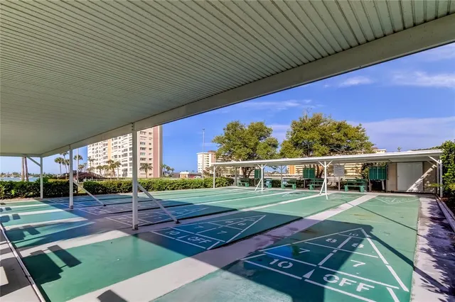 a view of an chairs and floor in front of a house