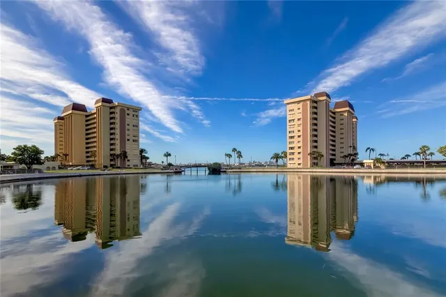 a view of a lake with a large building