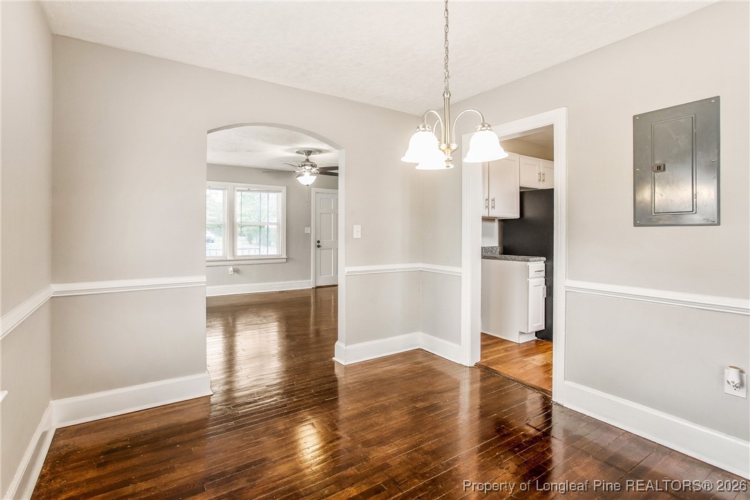 414 Mc Pherson Road Fayetteville, NC 28303 - Photo 5 of 16 a view of a kitchen with wooden floor and a window