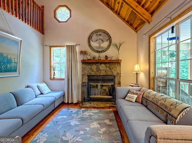 a bedroom with bed and a couch