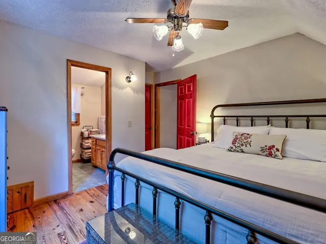 a view of an empty room with furniture