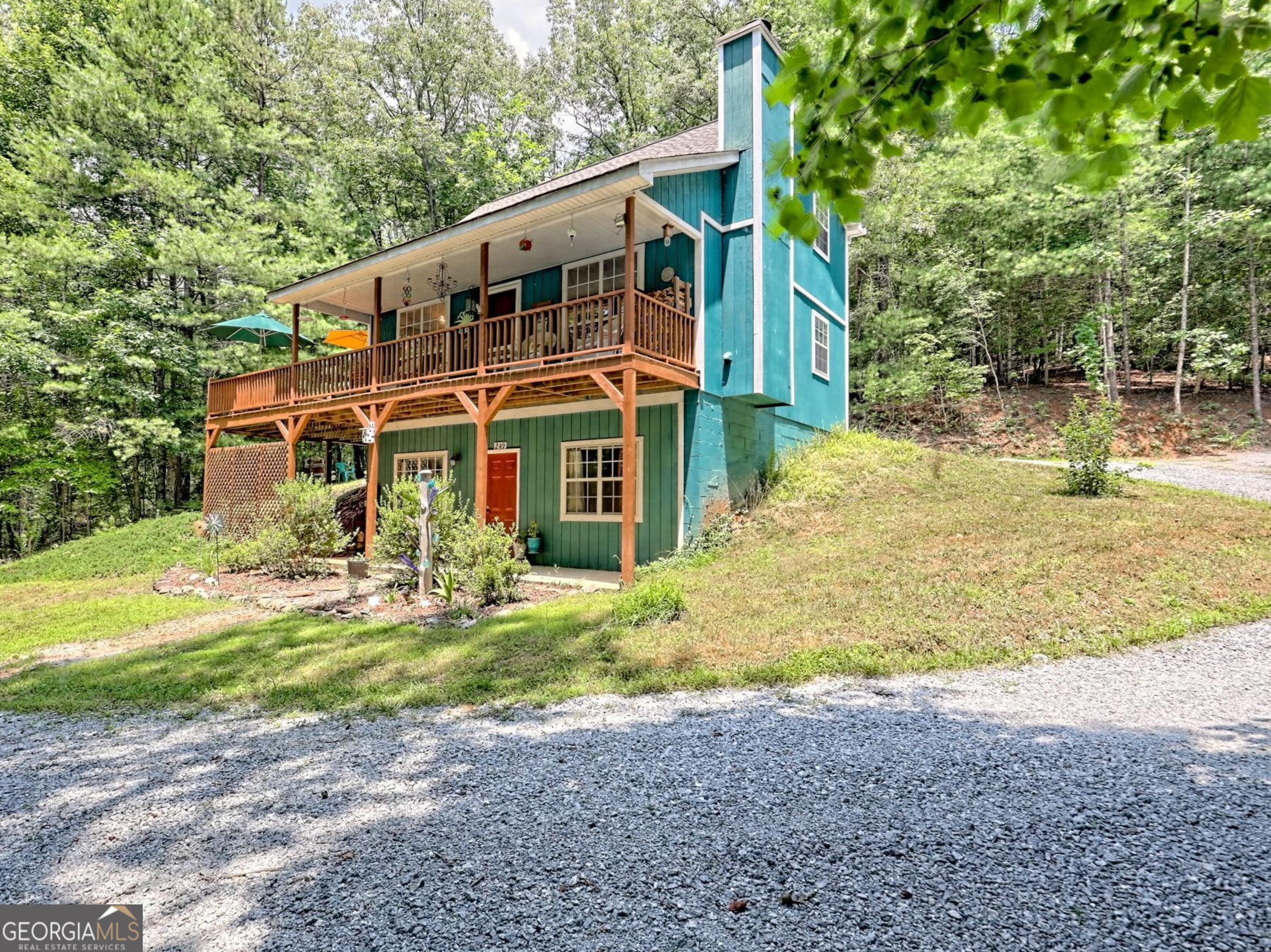 249 Spruce Creek Road Lakemont, GA 30552 - Photo 4 of 55 a front view of a house with a yard