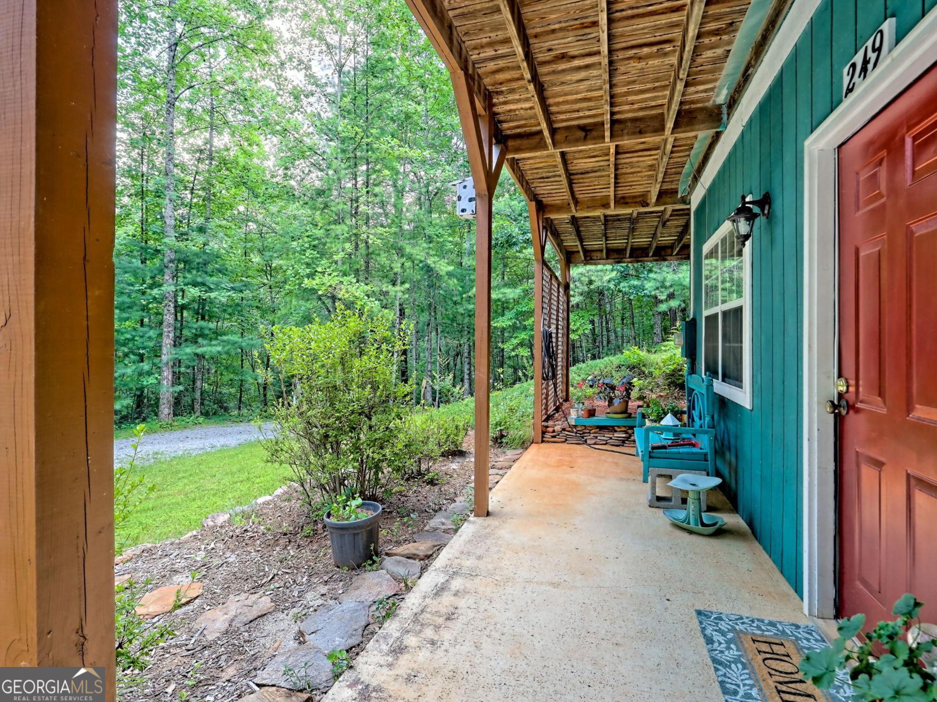 249 Spruce Creek Road Lakemont, GA 30552 - Photo 50 of 55 a view of a backyard with garden