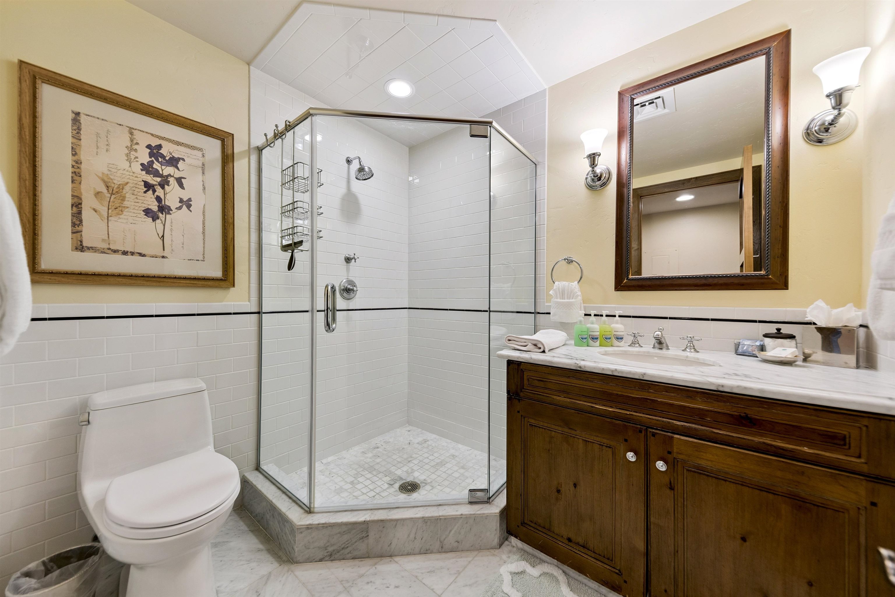 6750 North Lake Boulevard, Unit 10B Tahoe Vista, CA 96148 - Photo 18 of 23 a bathroom with a shower sink and mirror