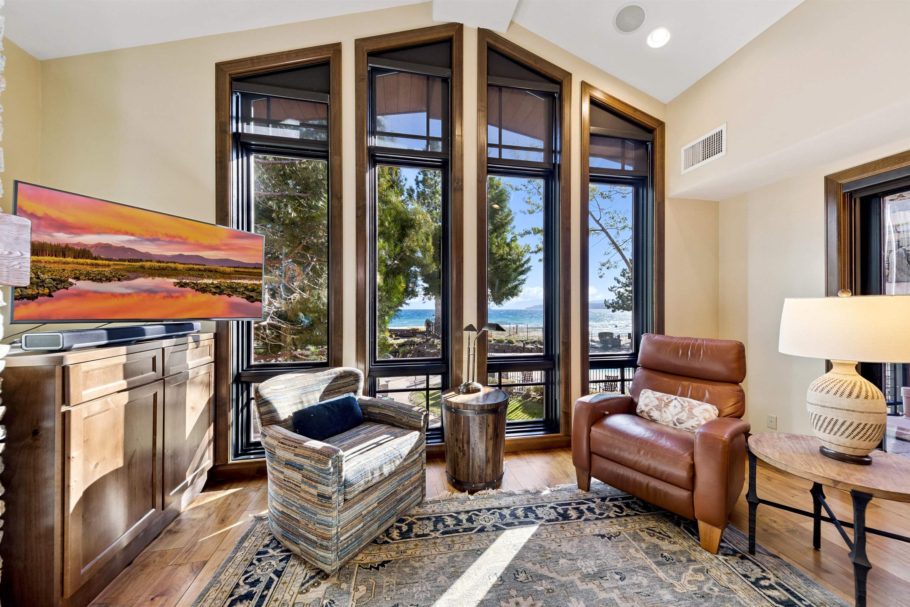 6750 North Lake Boulevard, Unit 10B Tahoe Vista, CA 96148 - Photo 4 of 23 a living room with furniture and a fireplace