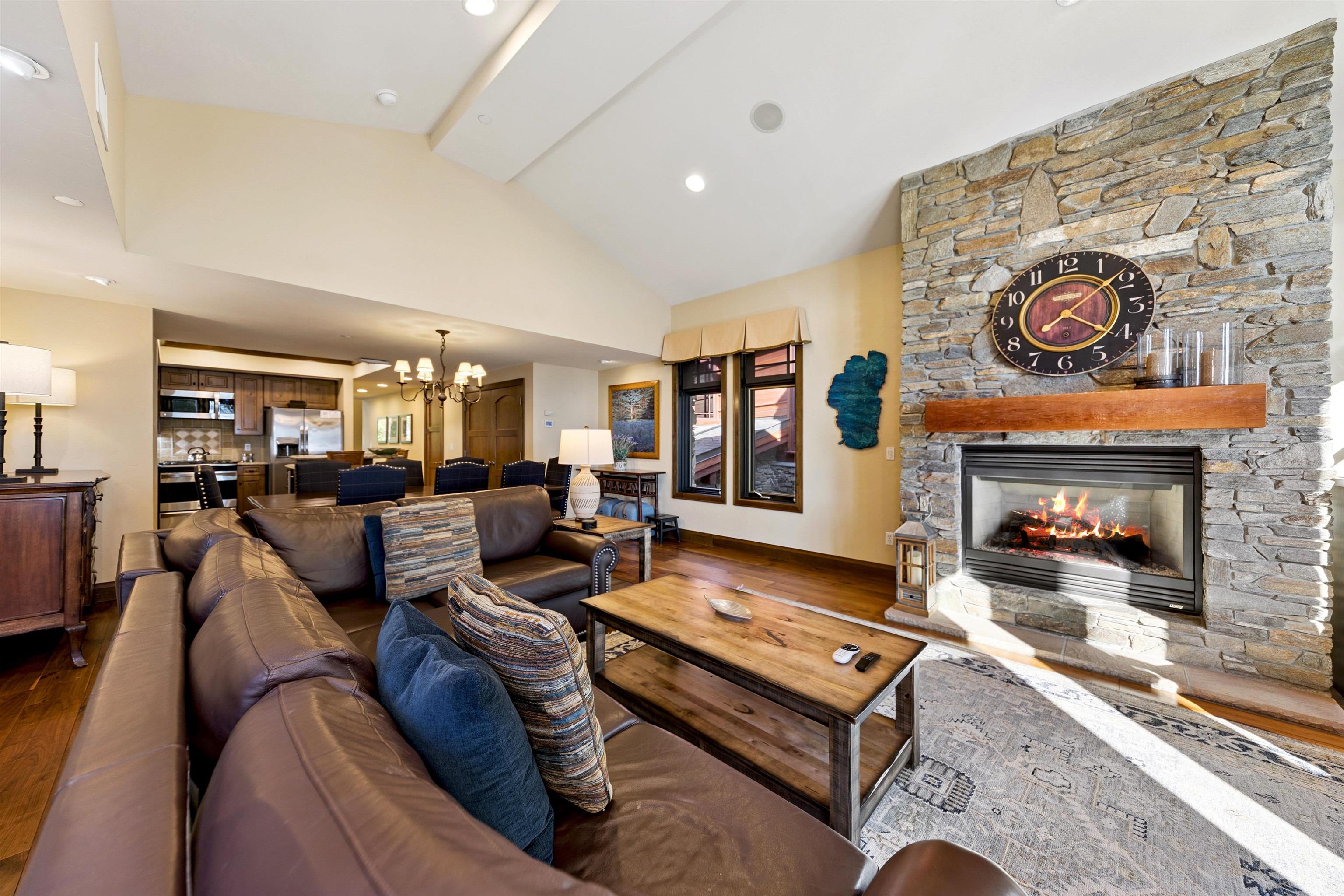 6750 North Lake Boulevard, Unit 10B Tahoe Vista, CA 96148 - Photo 7 of 23 a living room with furniture and a fireplace