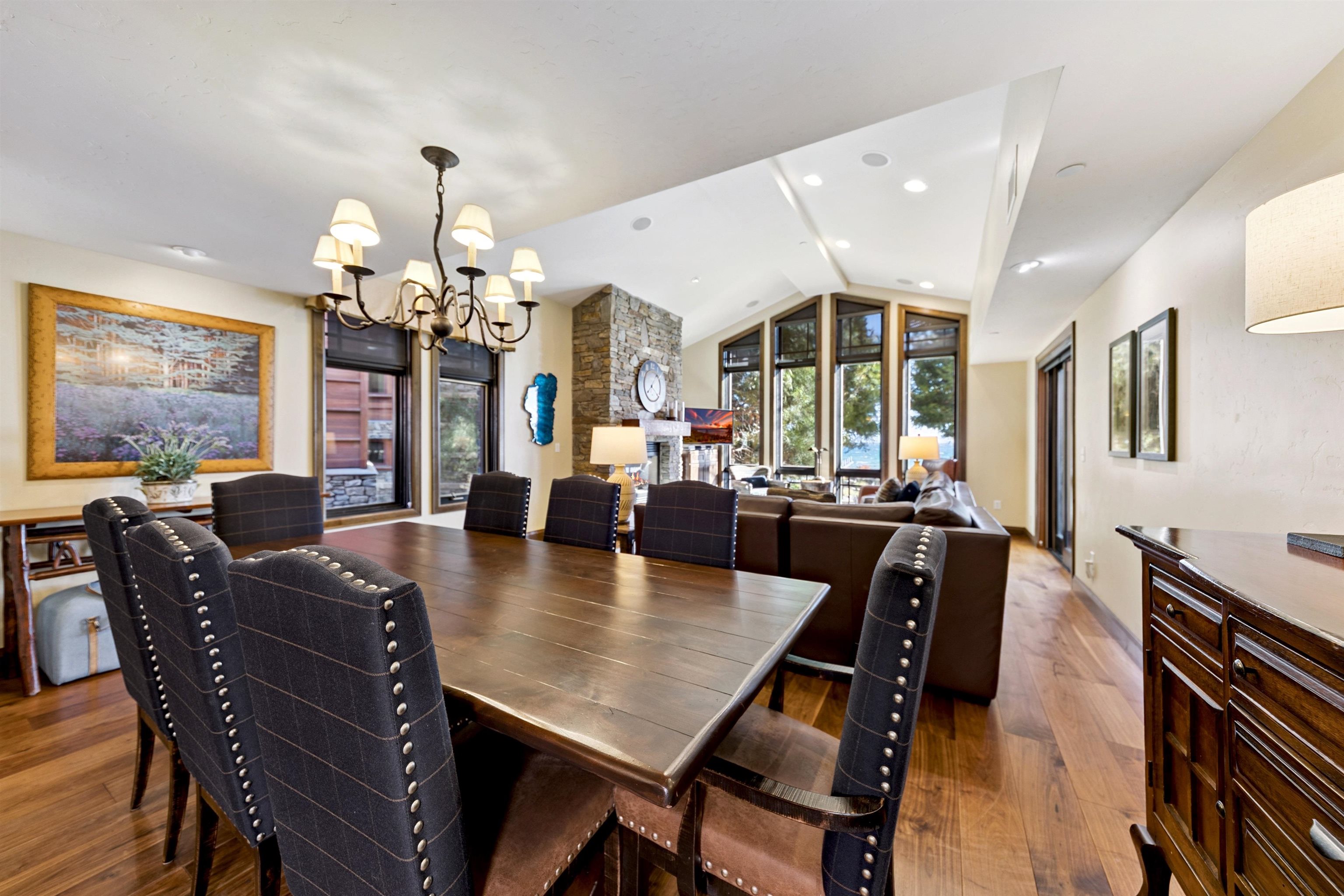 6750 North Lake Boulevard, Unit 10B Tahoe Vista, CA 96148 - Photo 9 of 23 a view of a dining room with furniture window and wooden floor
