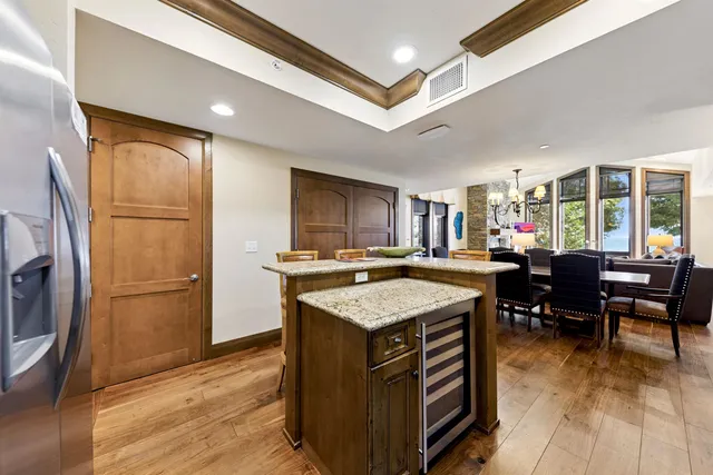 a kitchen with a counter top space and stainless steel appliances