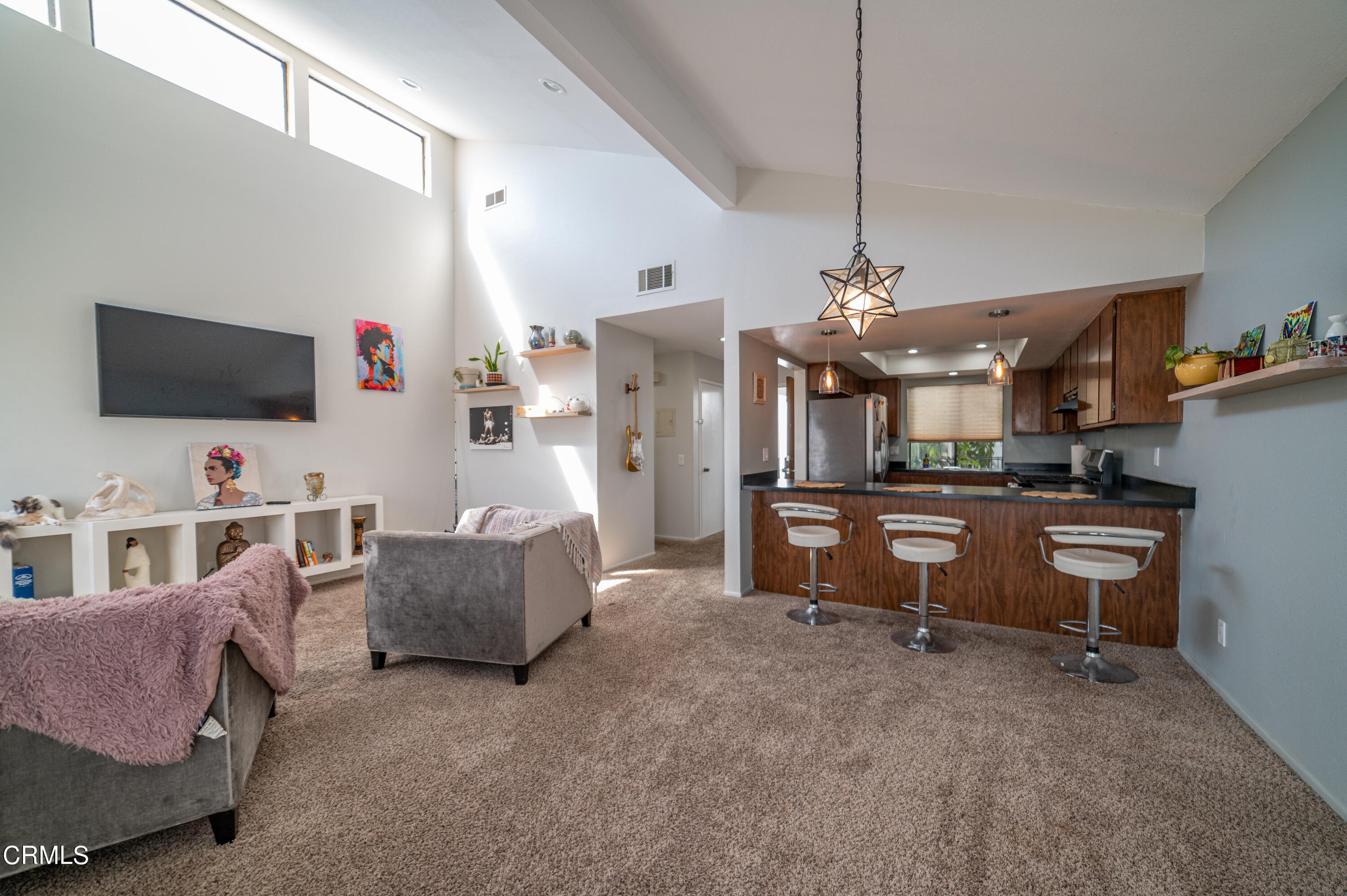 5170 Longfellow Way Oxnard, CA 93033 - Photo 1 of 12 a living room with furniture and a flat screen tv