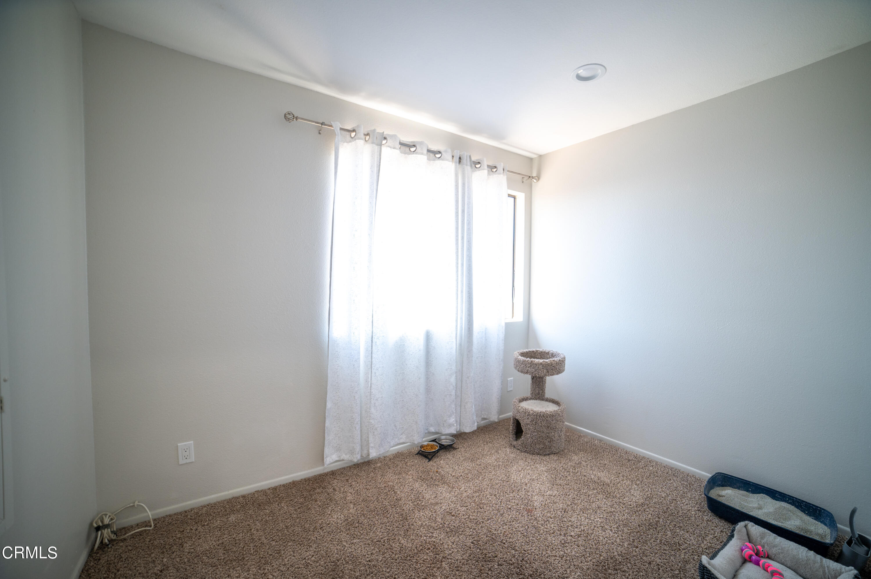 5170 Longfellow Way Oxnard, CA 93033 - Photo 12 of 12 a room that has a window and a chair