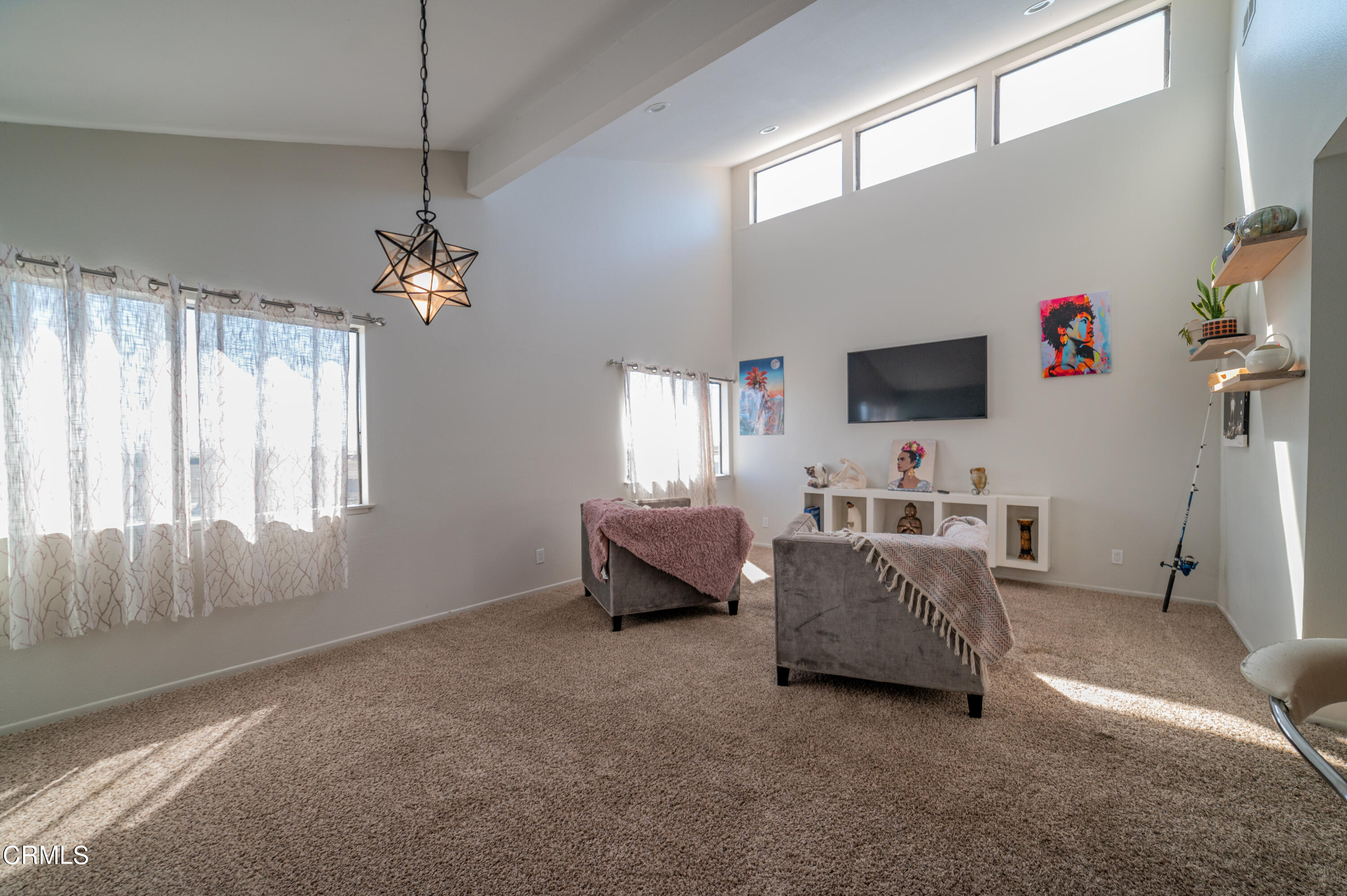 5170 Longfellow Way Oxnard, CA 93033 - Photo 4 of 12 a living room with furniture and a flat screen tv