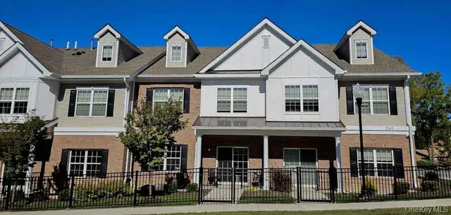 a front view of a large white building