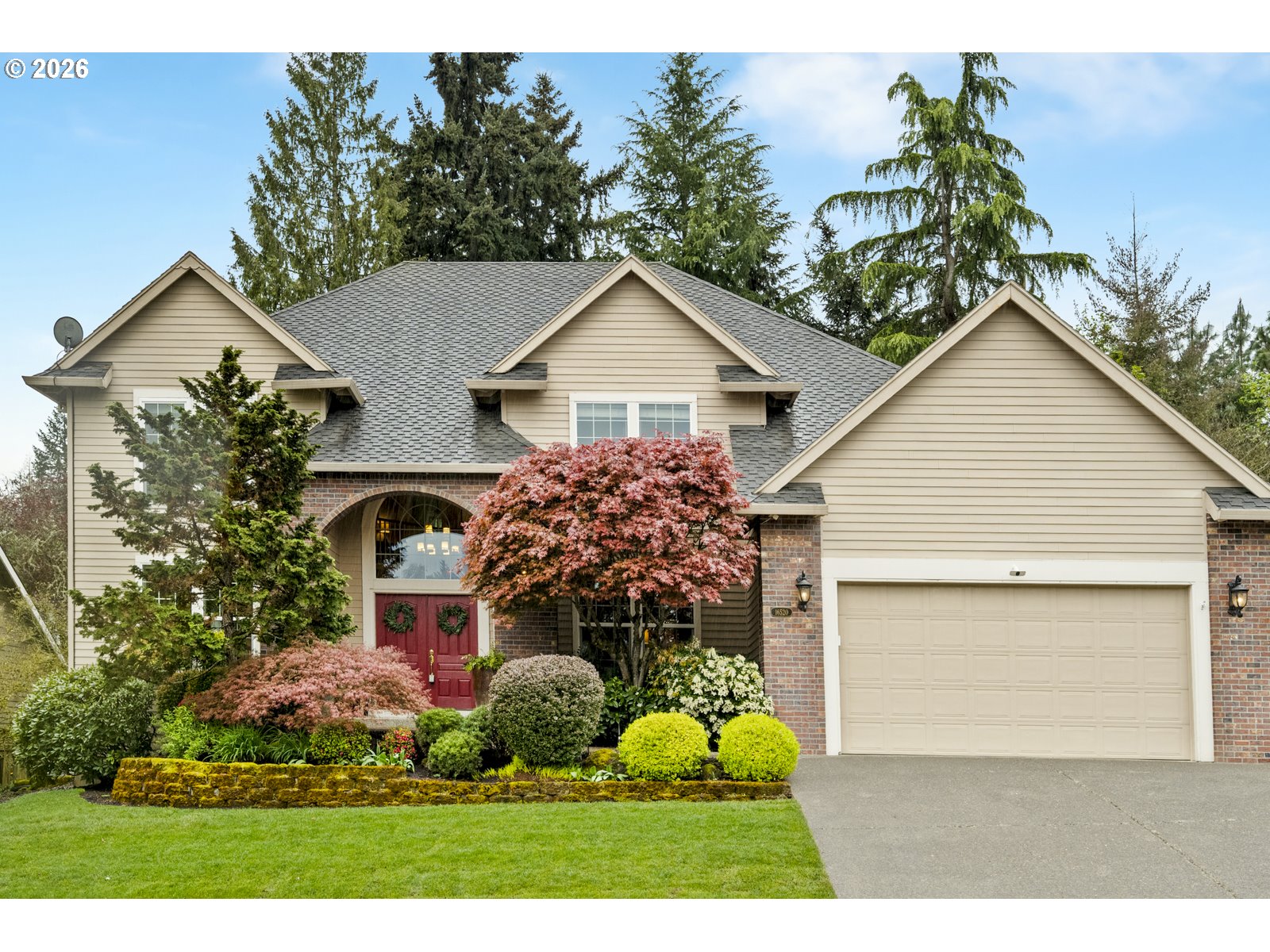 16520 Southwest Marcile Lane Beaverton, OR 97007 - Photo 1 of 45 a view of a house with a yard and potted plants