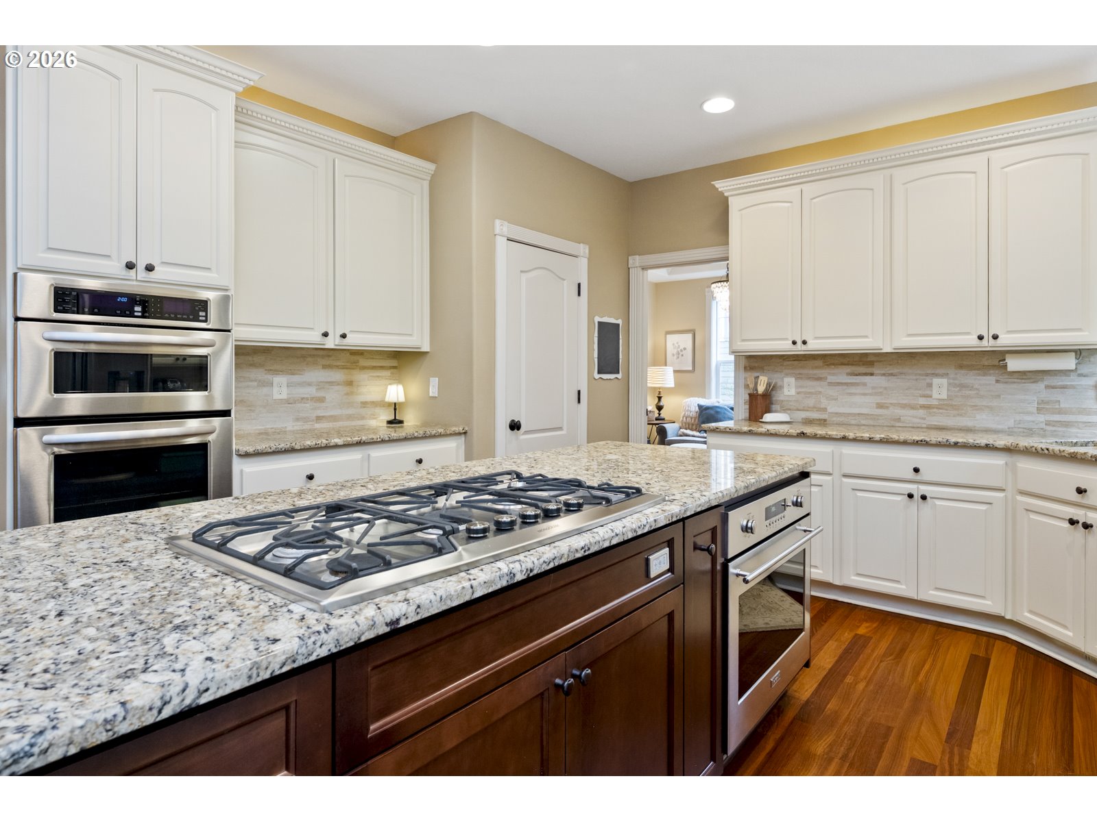 16520 Southwest Marcile Lane Beaverton, OR 97007 - Photo 13 of 45 a kitchen with stainless steel appliances granite countertop a stove sink and cabinets